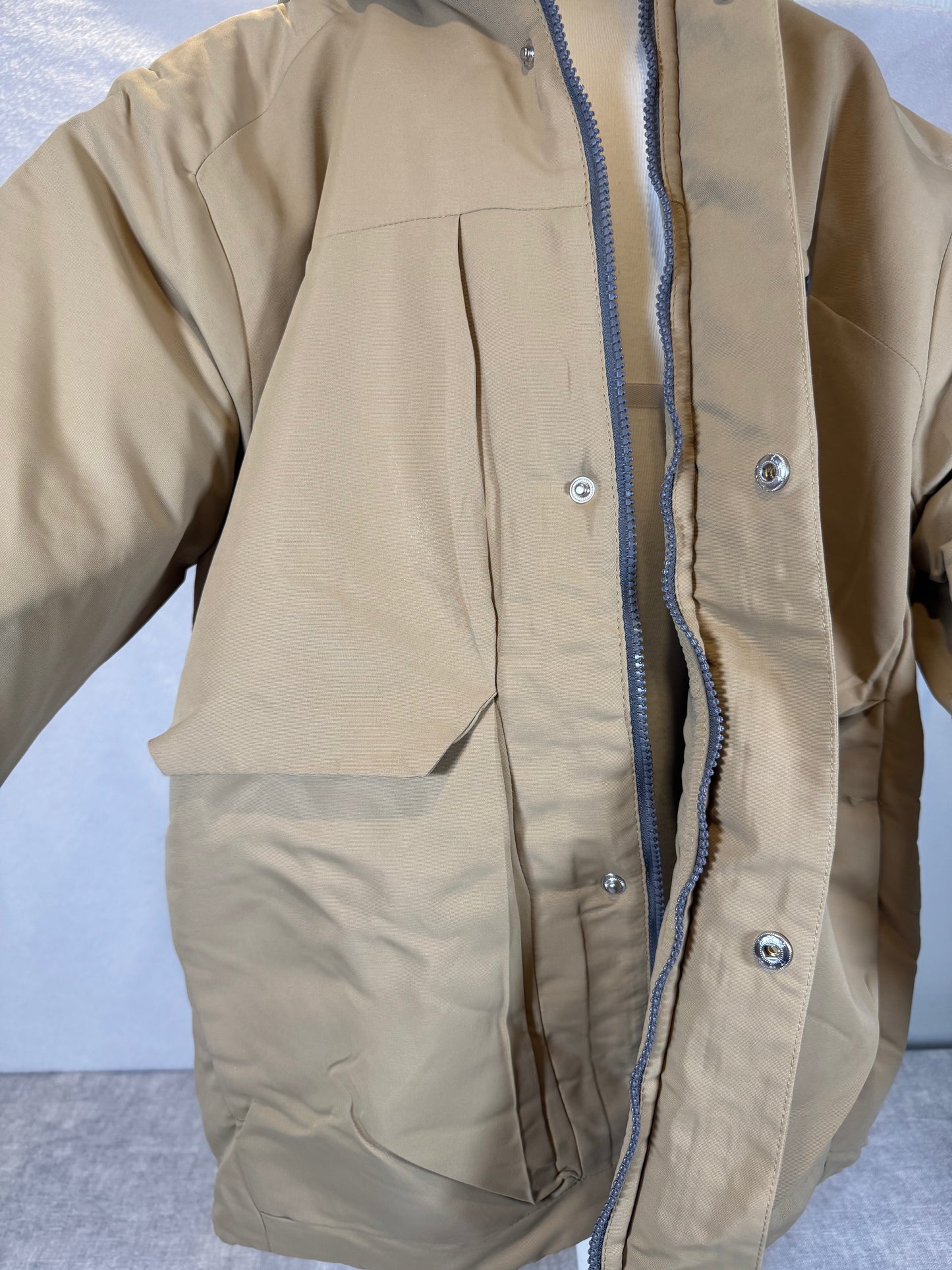 Beige Winterjacke Jungs 146/152