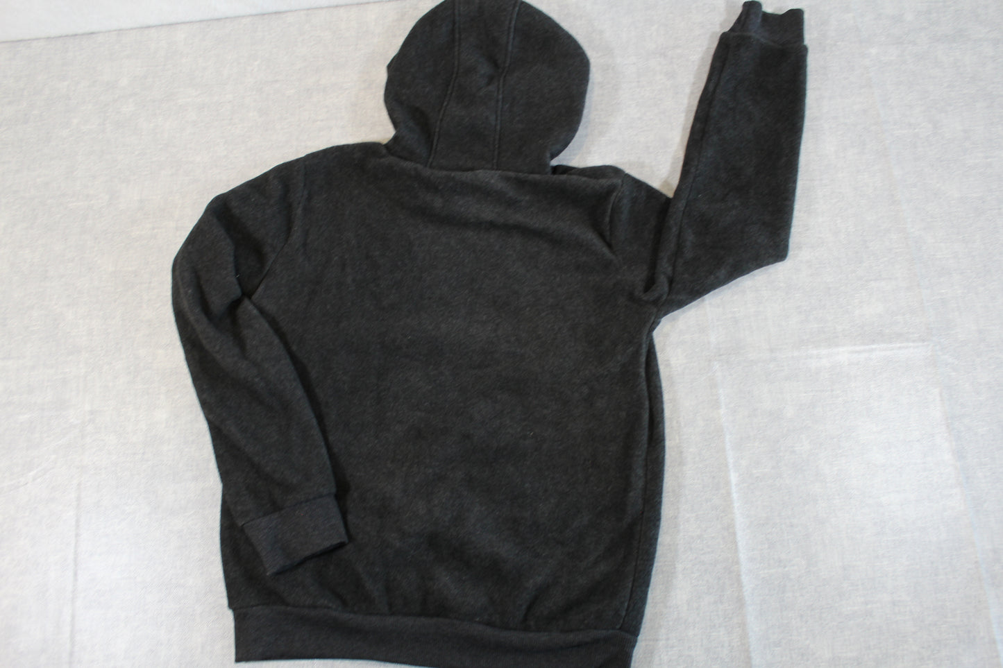 Schwarzer Kapuzenpullover Jungs 134/140
