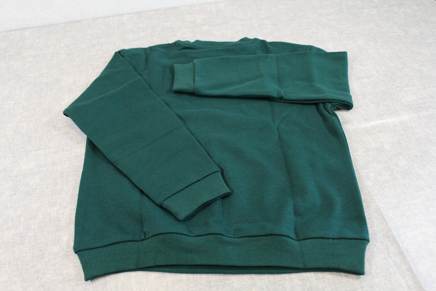 Grüner Pullover Jungs 134/140