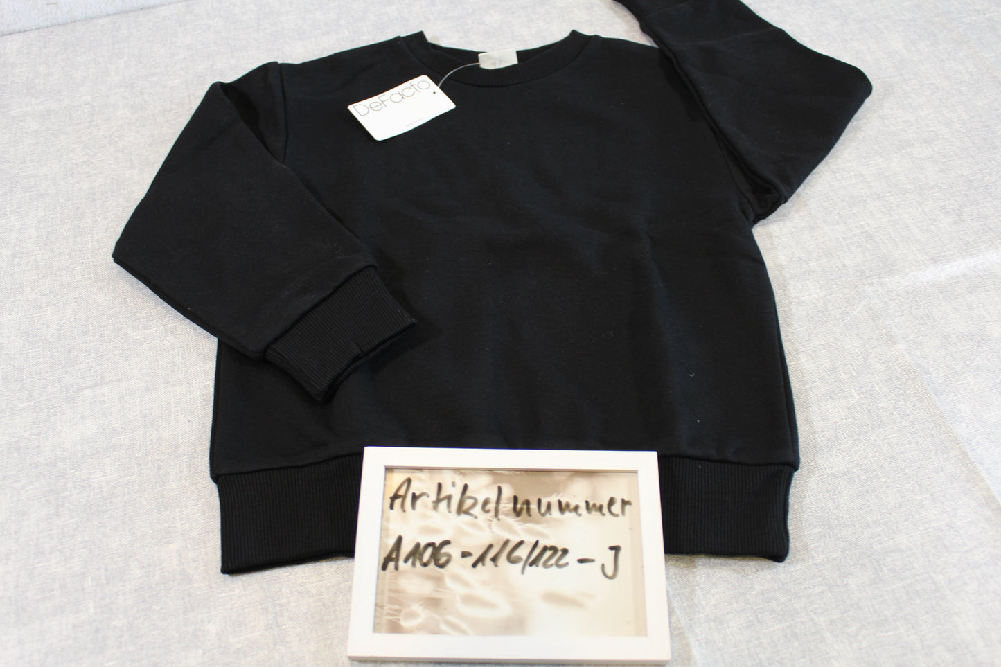 116/122 Schwarzer Pullover Jungs