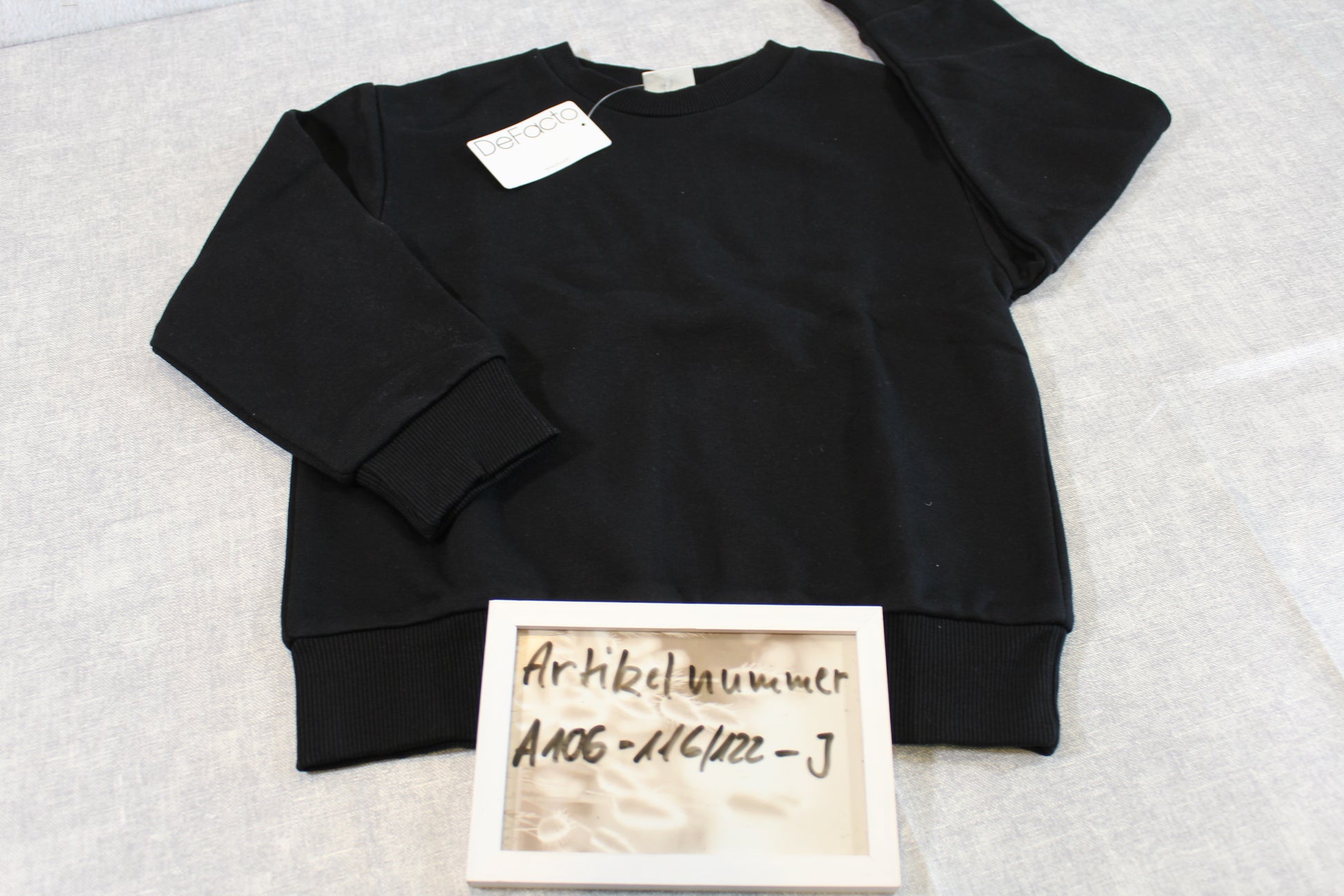 116/122 Schwarzer Pullover Jungs