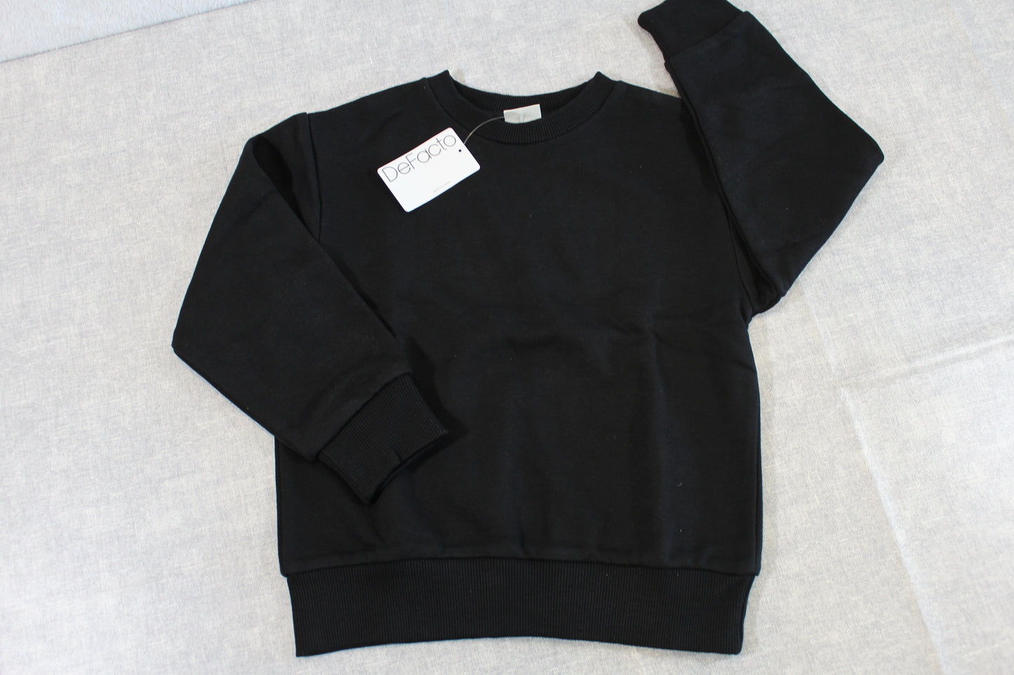 Schwarzer Pullover Jungs 116/122