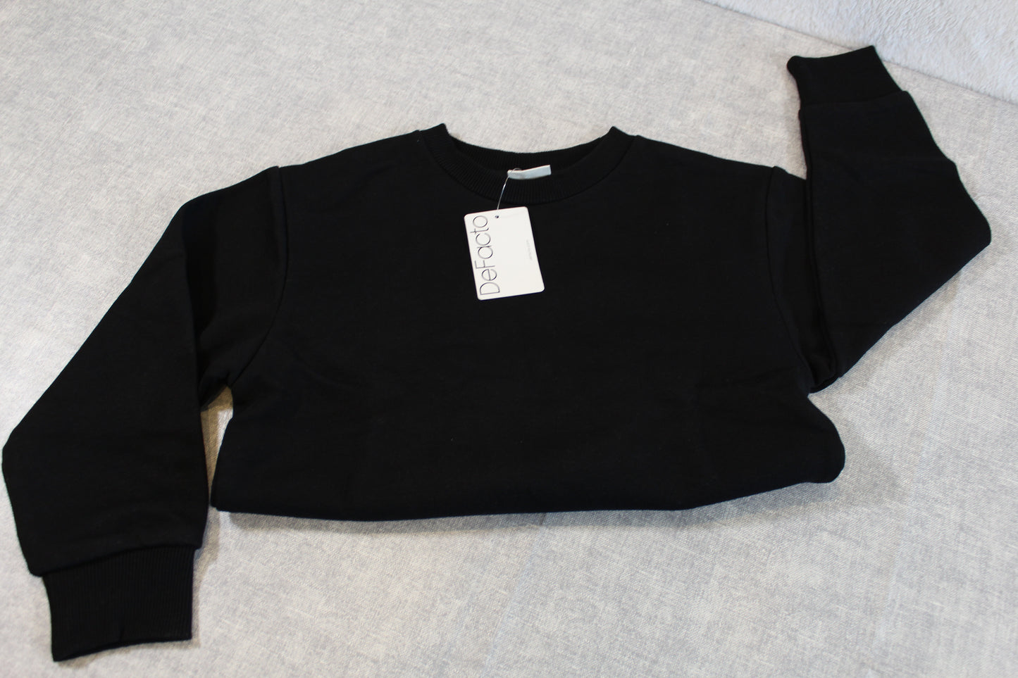 Schwarzer Pullover Jungs 116/122