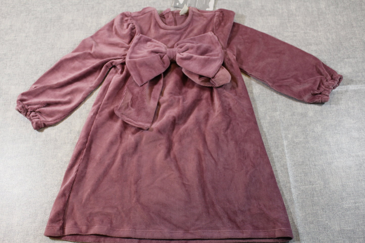 kuscheliges zartrosanes Kleid mit Schleife 98/104