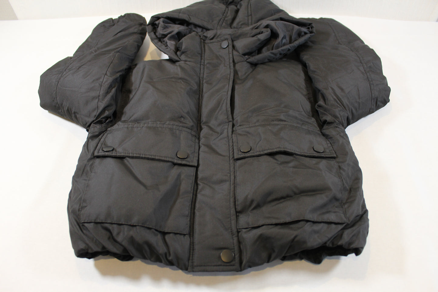 Schwarze warme Jacke Mädchen 122/128