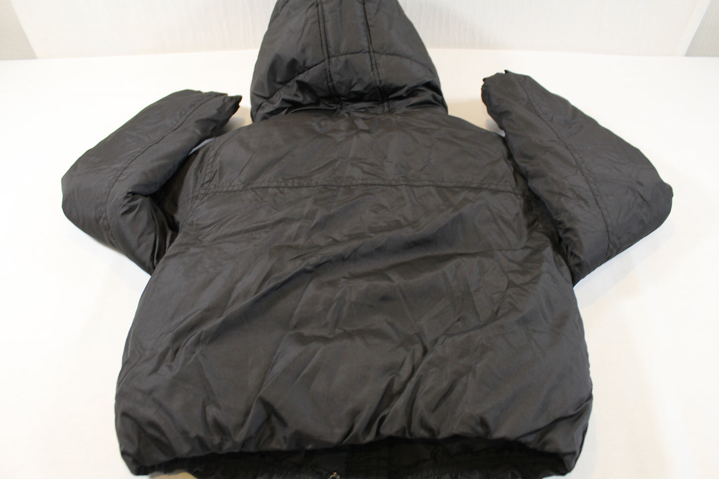 Schwarze warme Jacke Mädchen 122/128