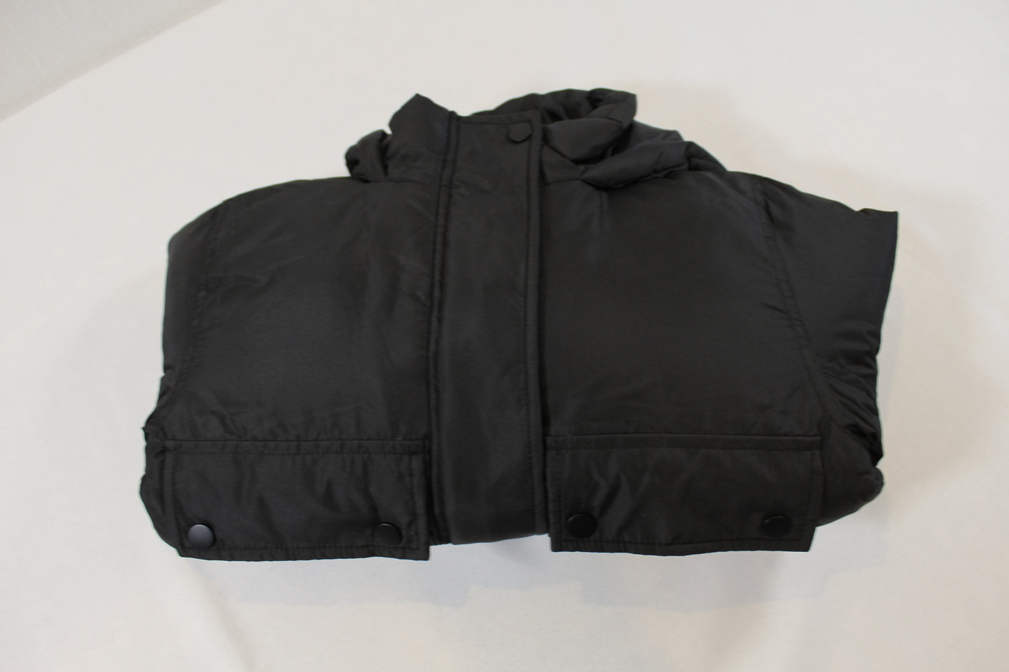 Schwarze warme Jacke Mädchen 122/128