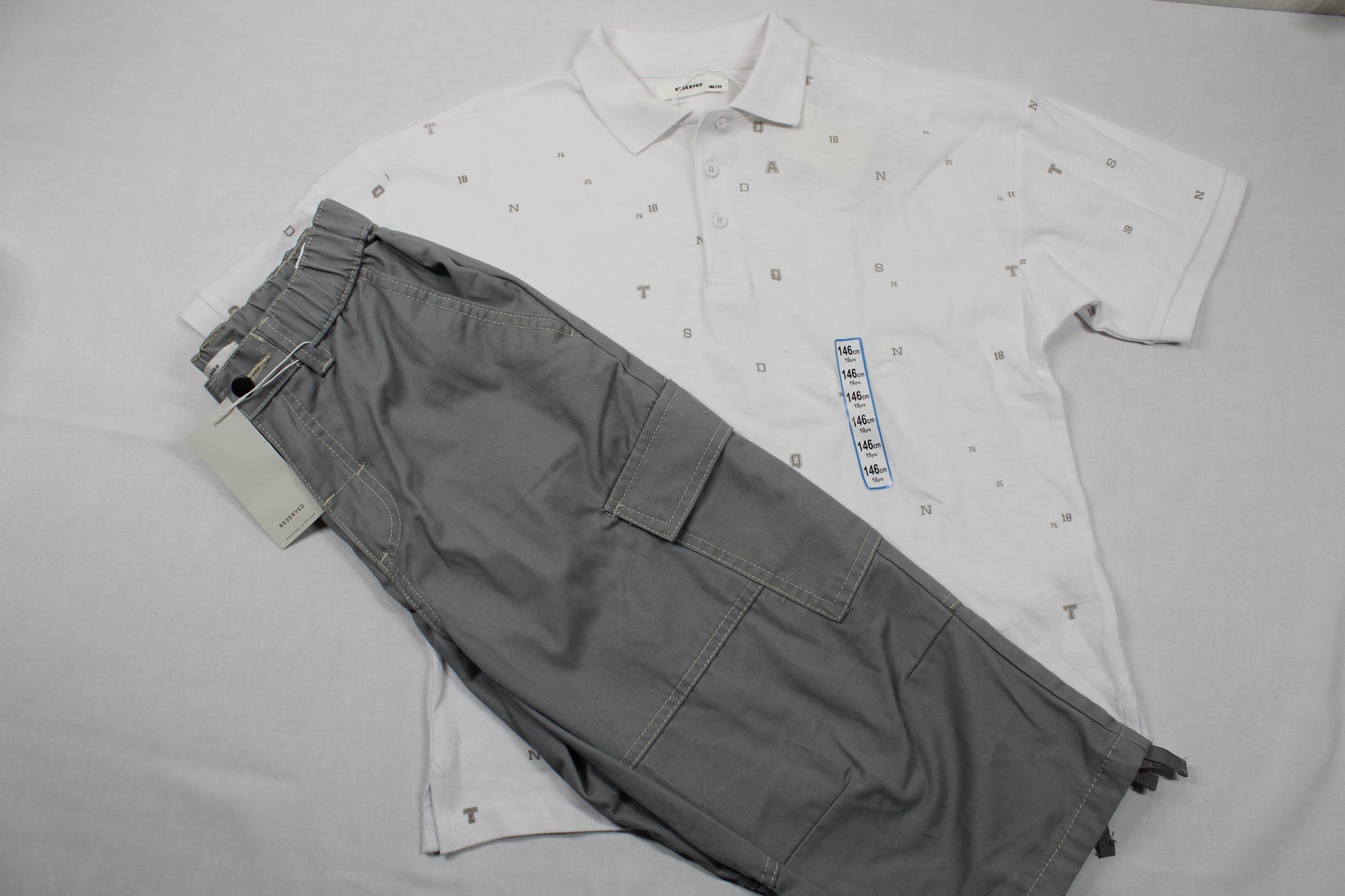 Set Sommerkleider Poloshirt Dreiviertel Hose Jungs sehr gefragt 146/152