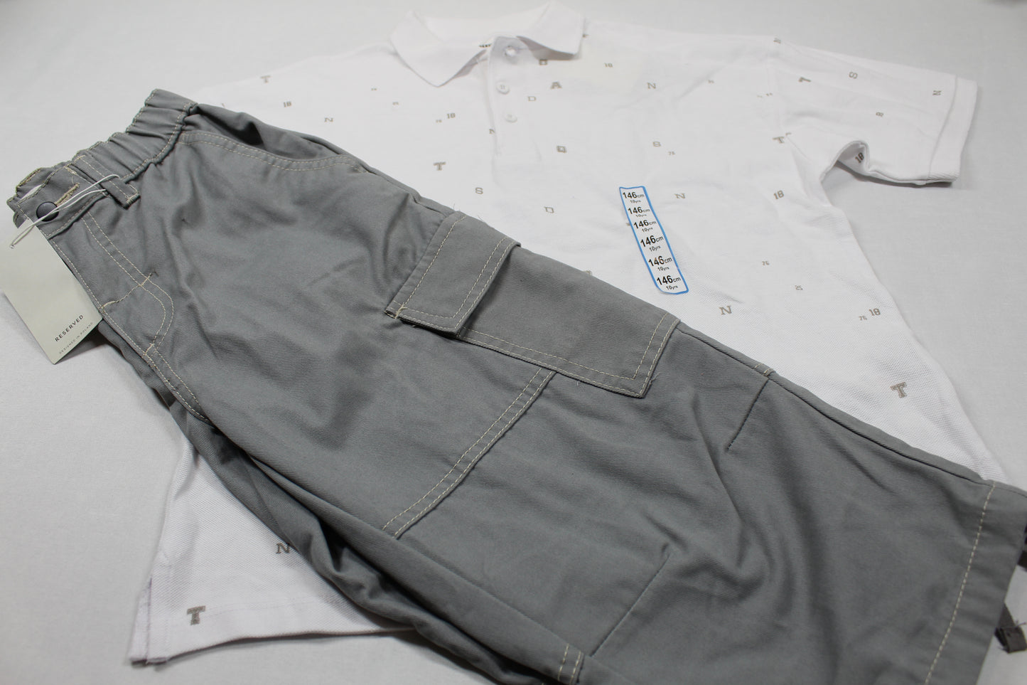 Set Sommerkleider Poloshirt Dreiviertel Hose Jungs sehr gefragt 146/152