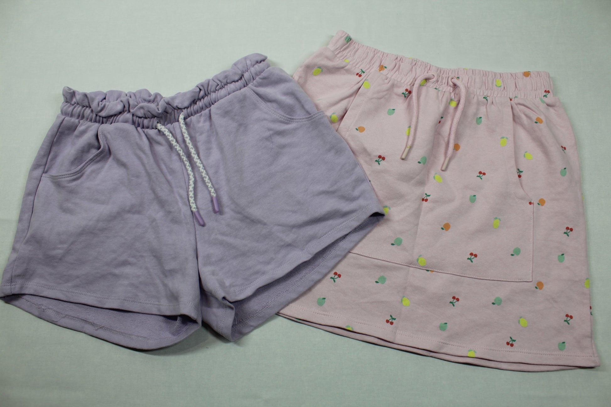 Set Rock rosa Motiv kurze lila Short Mädchen A-Ware 158/164
