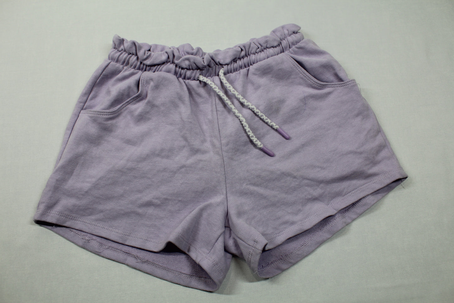 Set Rock rosa Motiv kurze lila Short Mädchen A-Ware 158/164