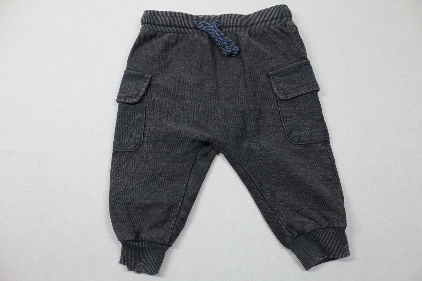 Set schwarze Jogging hellgrüner Body Jungs A-Ware 74/80